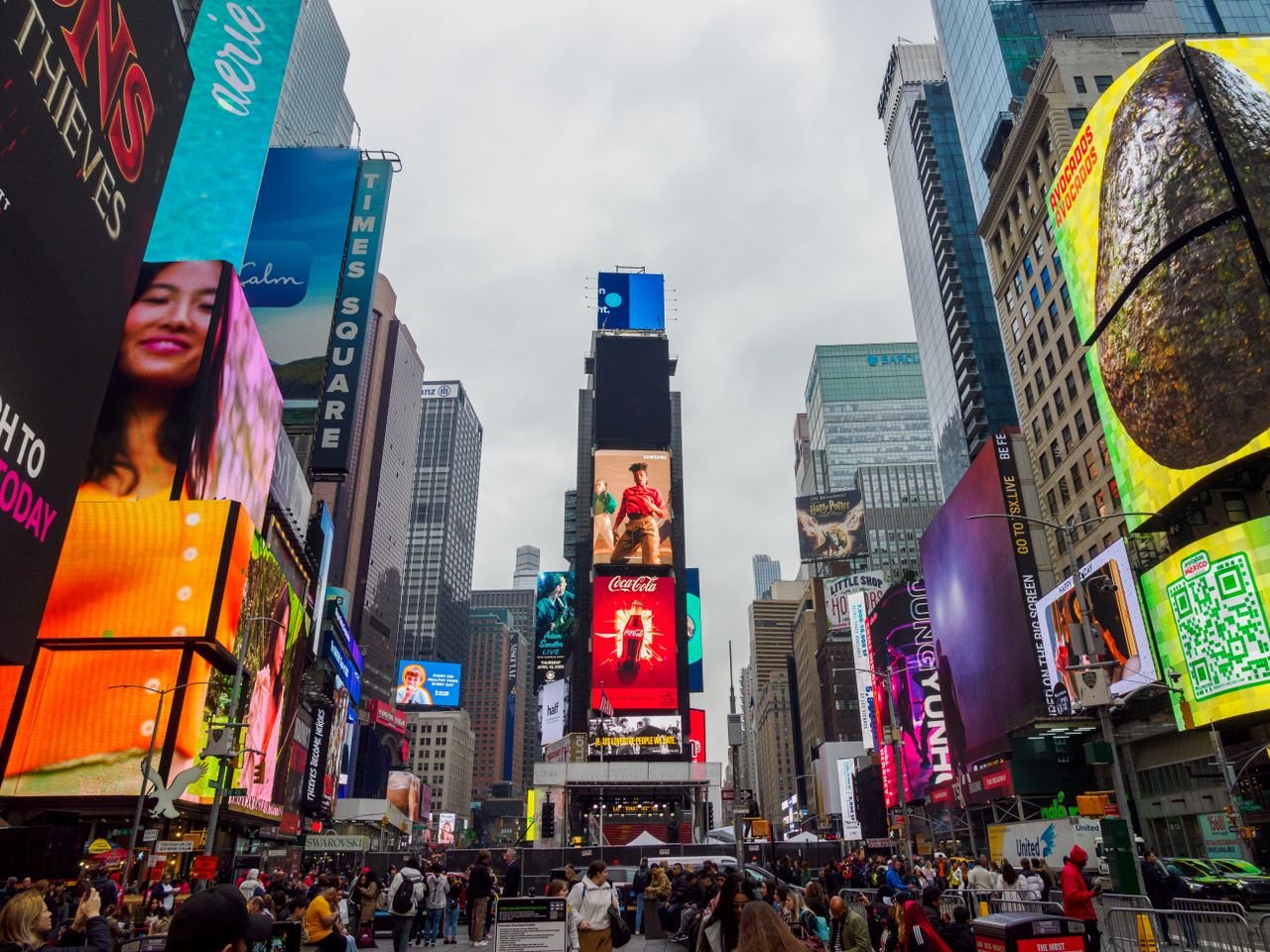 Capture of bustling Times Square with bright advertisements in New York, USA.
